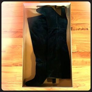 Slouchy tall black boots